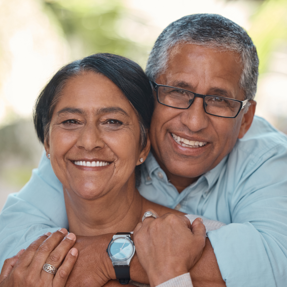 middle age man and woman embracing